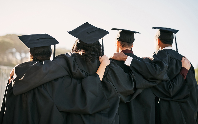 rearview-shot-of-a-group-of-students-during-graduation